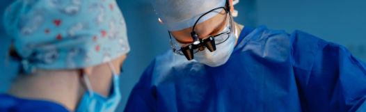 Operation in hospital. Health care concept. Neurosurgeons at work. Selective focus. Medical room background. Castle Rock neurosurgeon performs minimally invasive spine surgery.