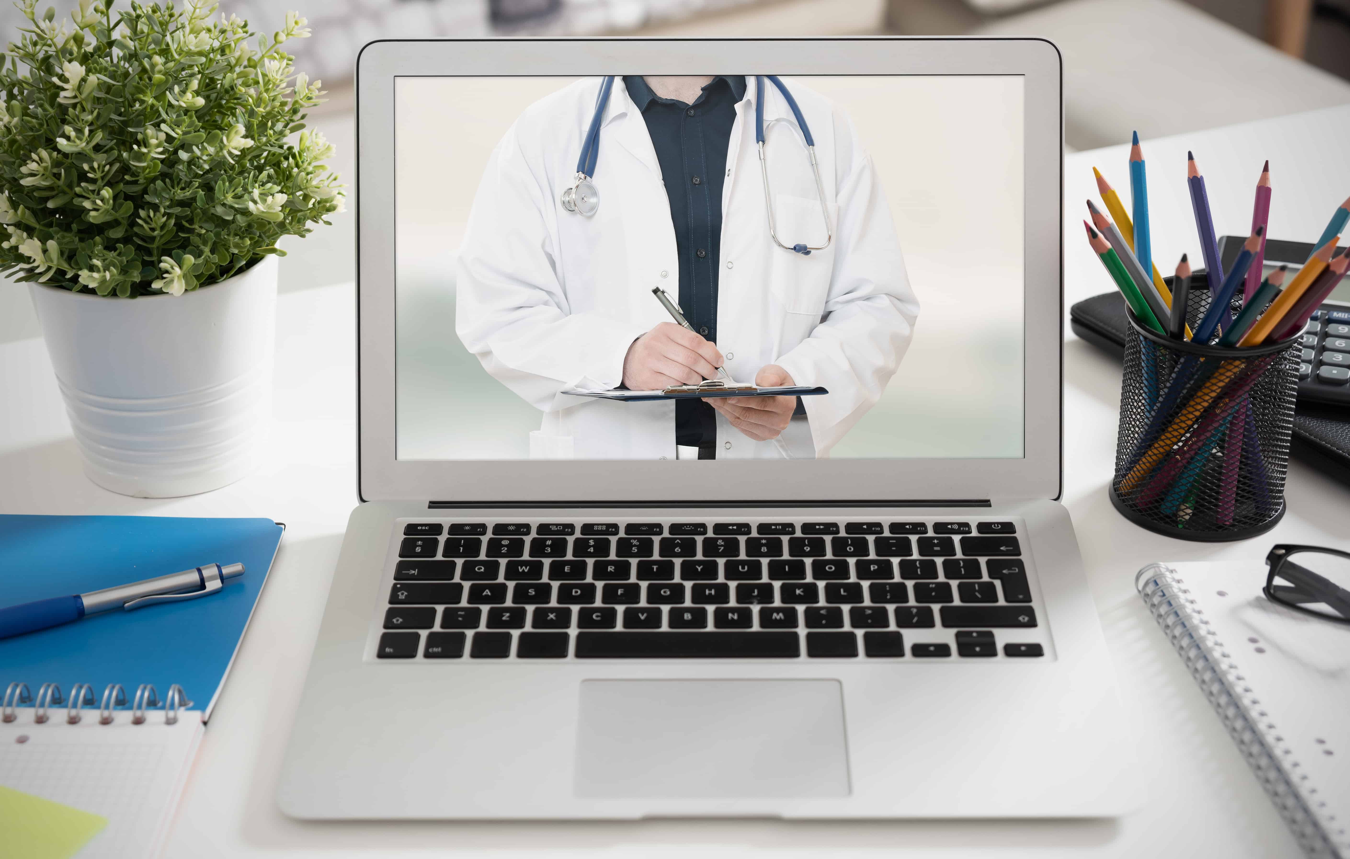 Picture of telehealth physician on computer screen.