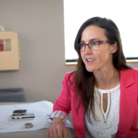 Picture of Denver spine surgeon Angela Bohnen discussing signs when to go to the ER for back pain.