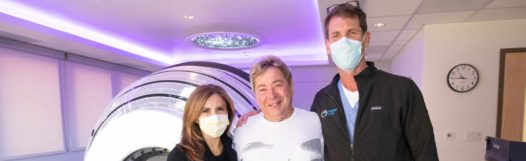 Bill Lawson, with Dr. J. Adair Prall and Dr. Darlene Bugoci, was the first patient in the Rocky Mountain region to have brain tumor treatment with the Zap-X gyroscopic radiosurgery system.
