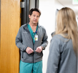 Neurosurgeon and psychiatrist talk with each other, physician collaboration within the Denver DBS team